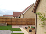 New Turfed lawn, circular patio feature, paving and garden walls
